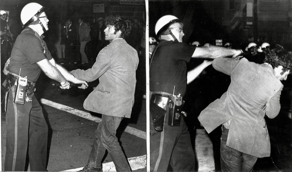 Oakland Police Department Office attacking anti-Vietnam War protester, 1967