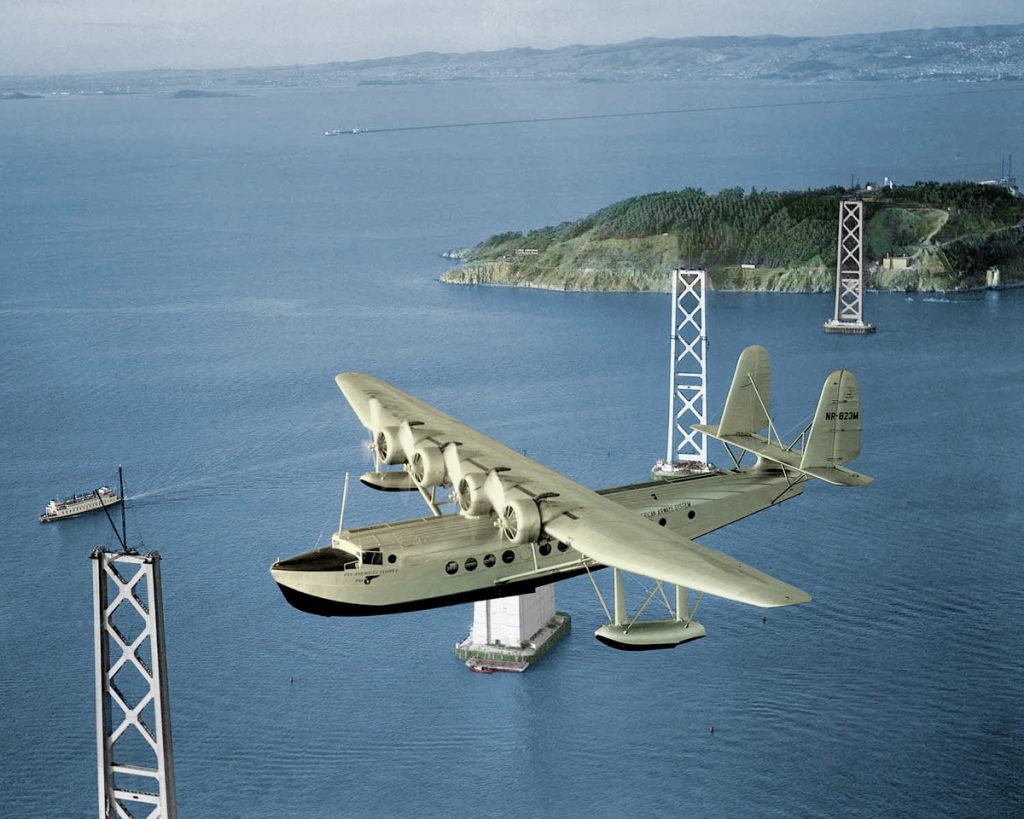 China Clipper flying over under-construction Bay Bridge