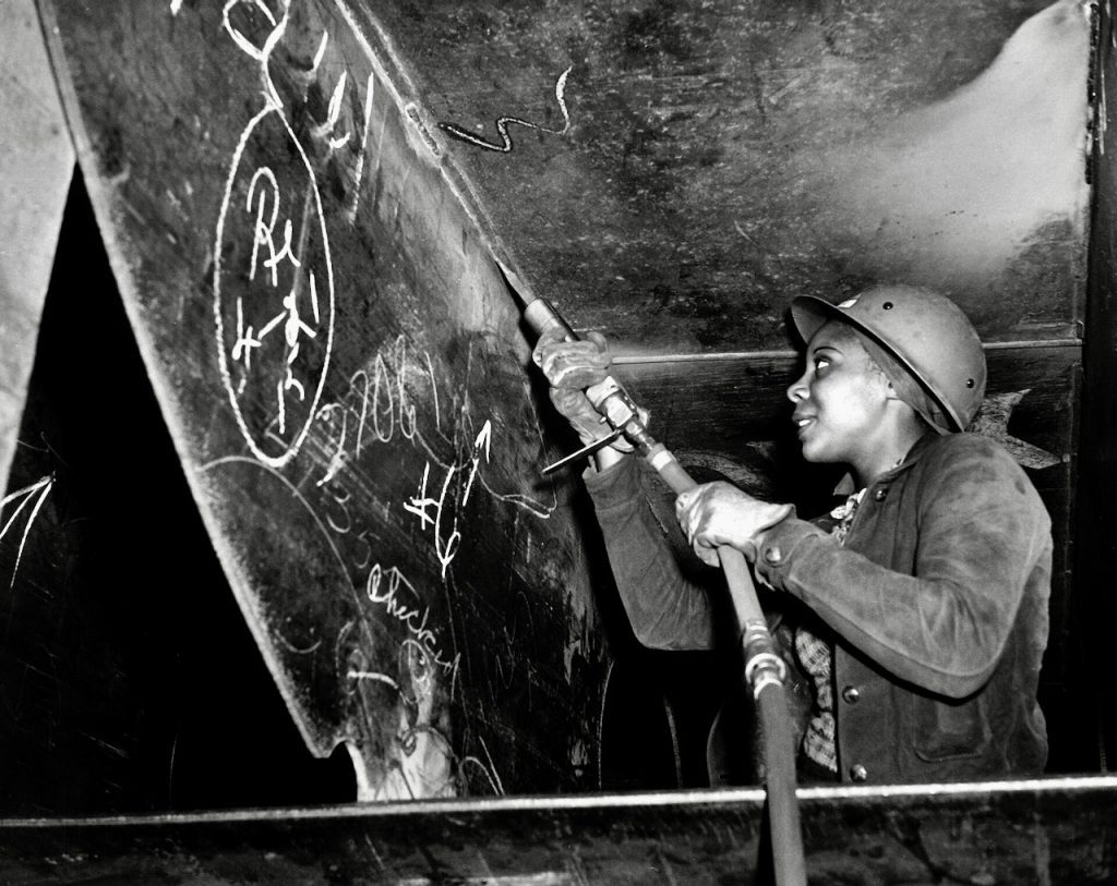 Eastine Cowner, former waitress, at work on Liberty ship SS George Washington Carver at Kaiser shipyards, Richmond, California, 1943